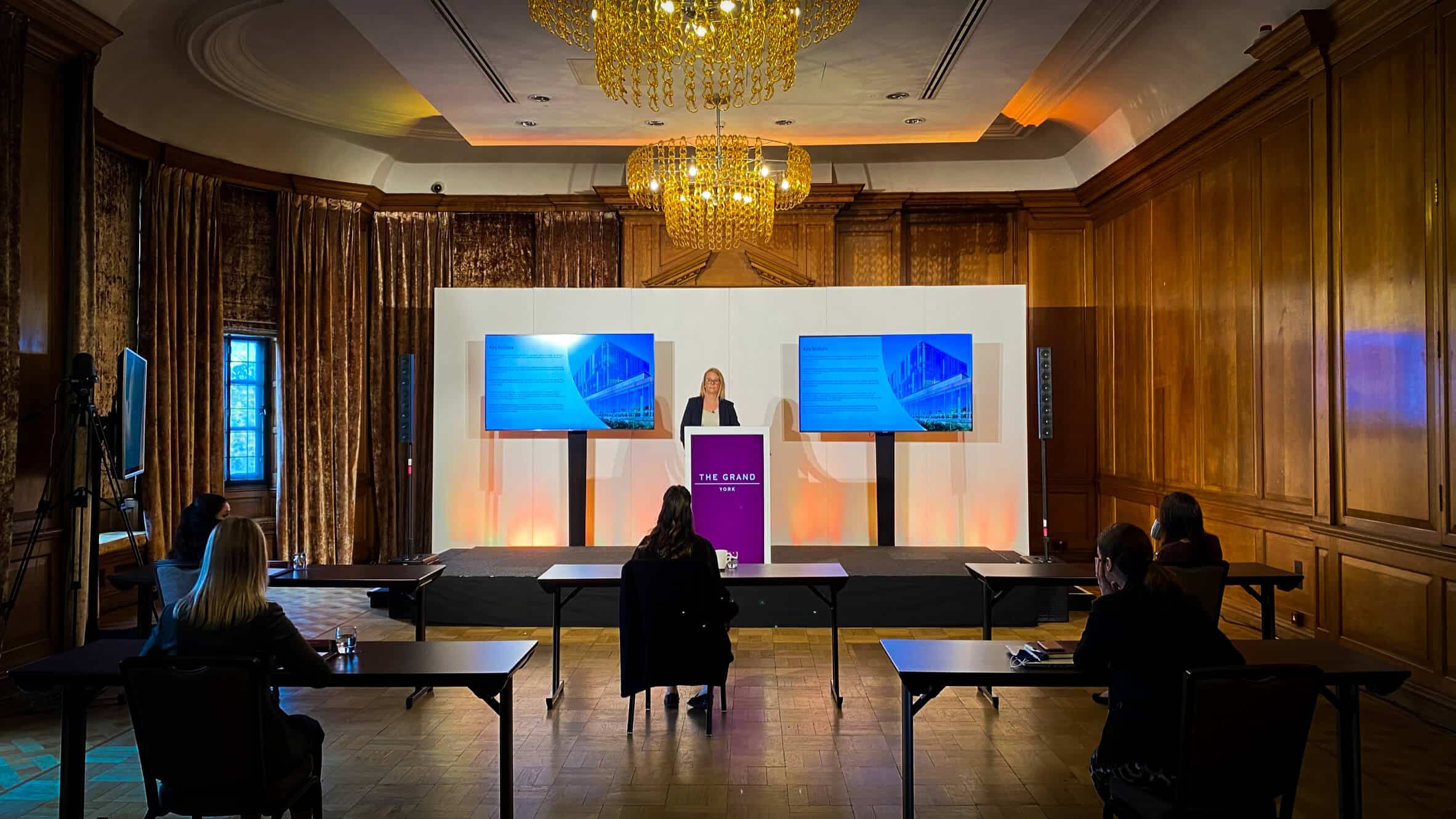 Hybrid event equipment including camera, lighting and screens provided for a conference at York Grand Hotel